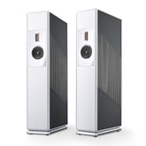A pair of Burmester BC150 floor-standing reference line speakers, featuring a white and gray color scheme with a solid aluminum frame and a front-firing tweeter and midrange driver - HiFi Centre.