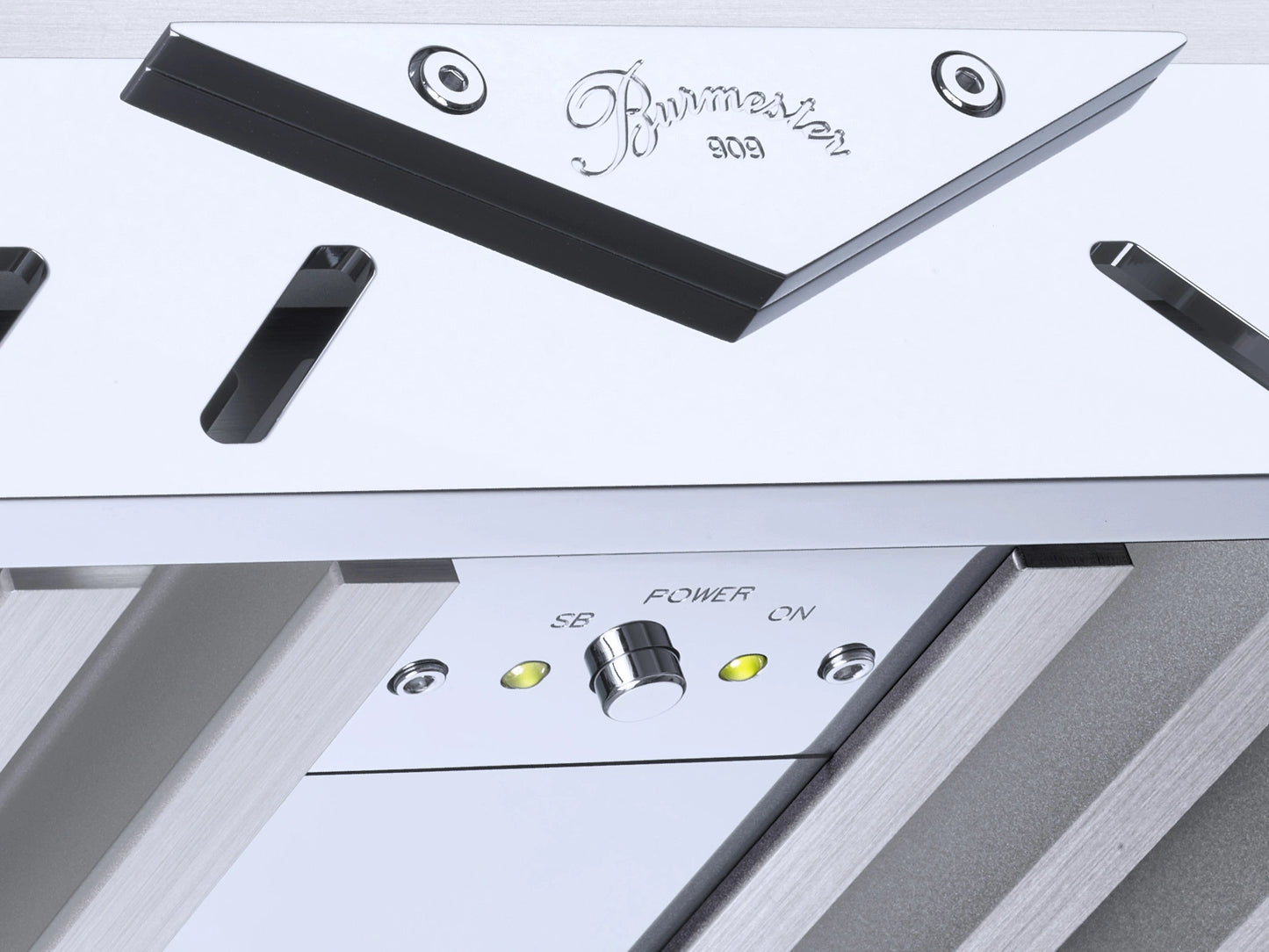 Close-up of a silver Burmester 909 Reference Line Power Amplifier with 'Burmester' branding and control buttons - HiFi Centre.