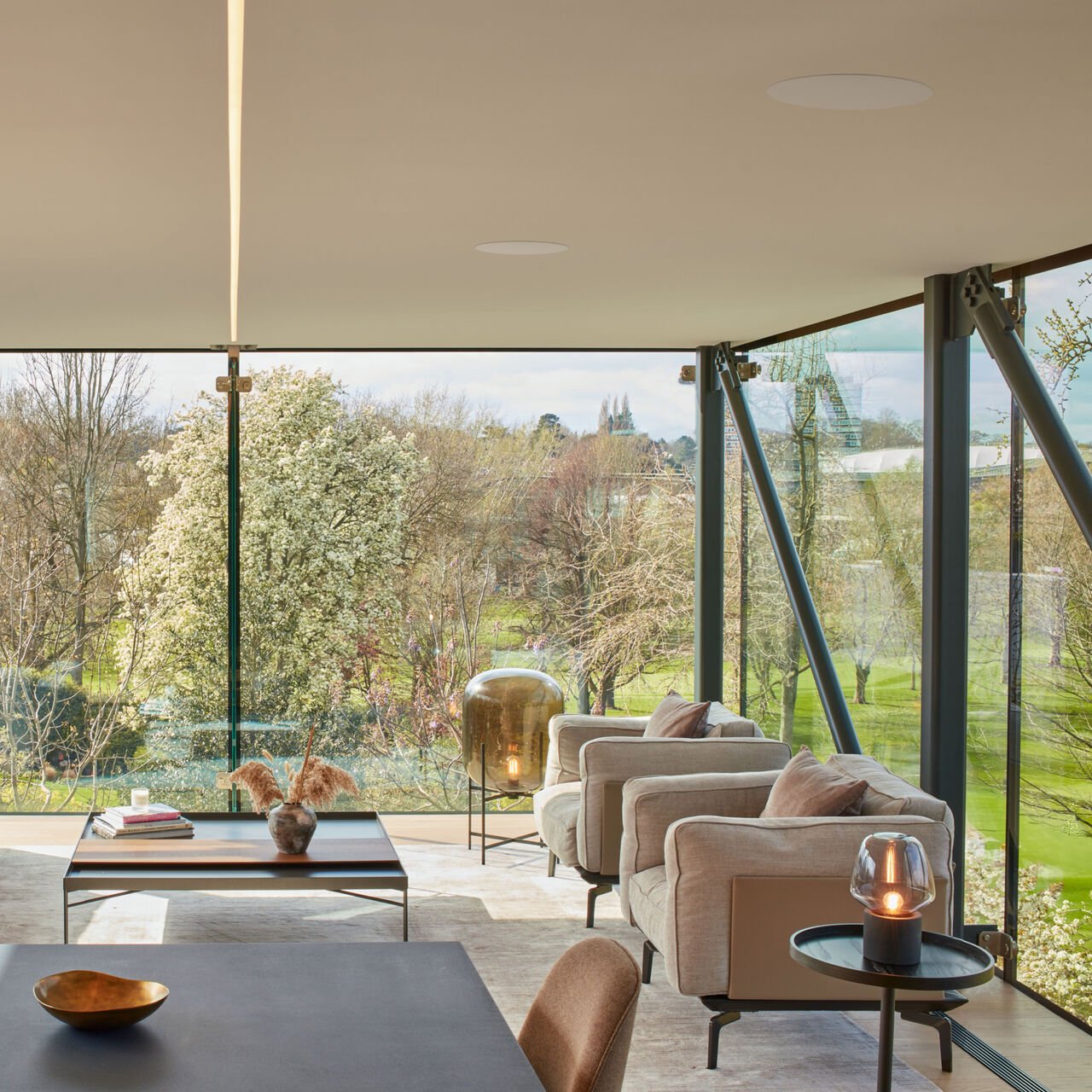 A ultra modern living room featuring a pair of B&W CCM662 In-Ceiling Speakers