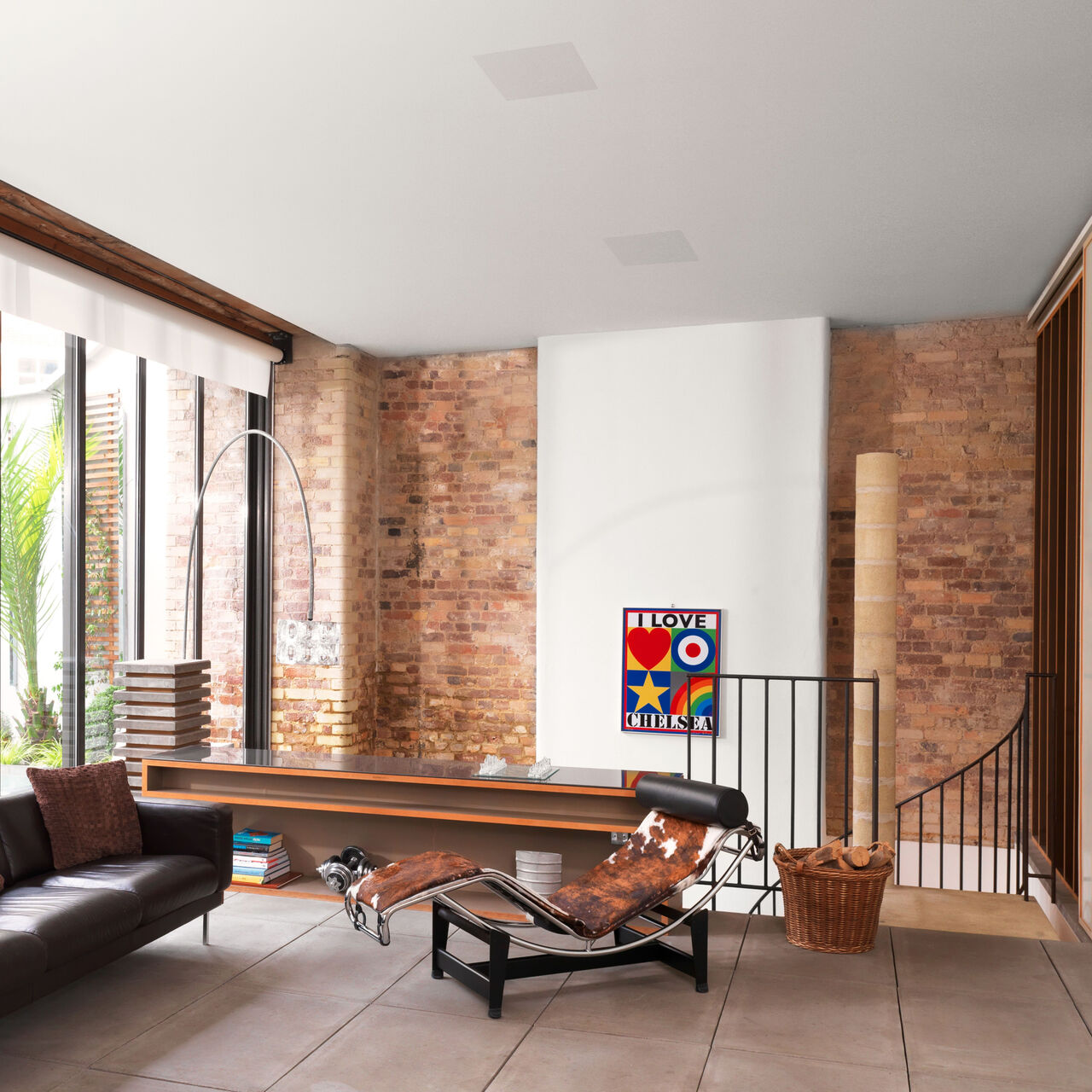 B&W CCM8.5 D in-ceiling speaker installed in a modern loft music room