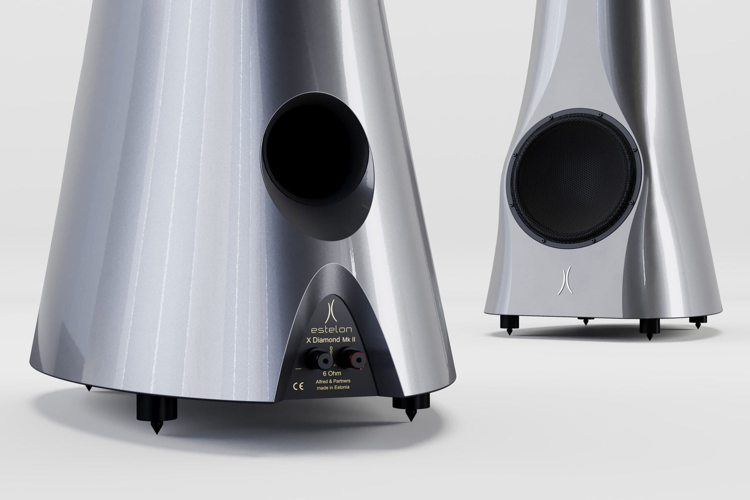 Silver Estelon X Diamond MK II Reference speakers with black cones on a white background.