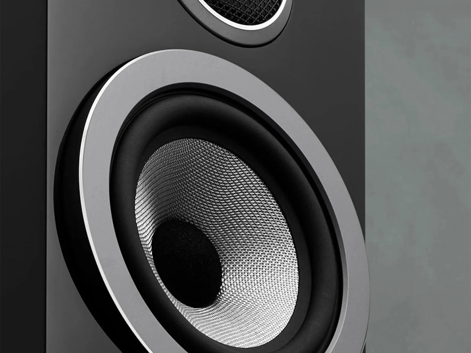 A closeup on the Continuum™ cone on a 705 S3 Bookshelf Speaker by B&W.
