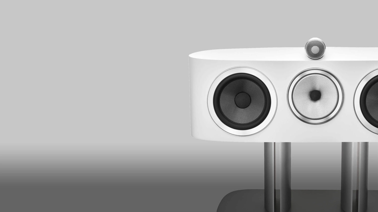 A closeup on a B&W HTM81 D4 Reference Centre Channel speaker in satin white finish.