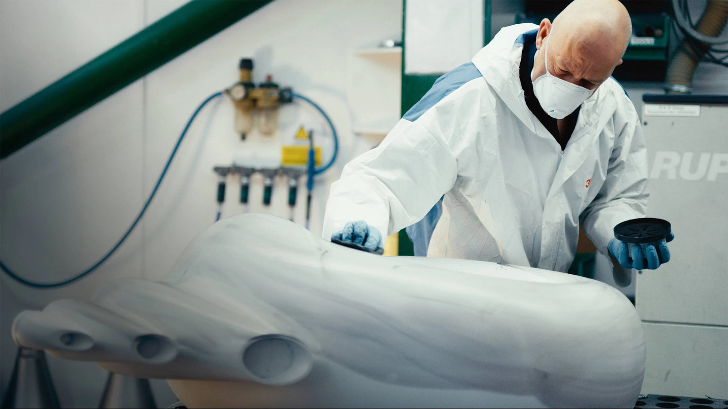 An engineer crafting B&W Nautilus 4 Way Active Speaker