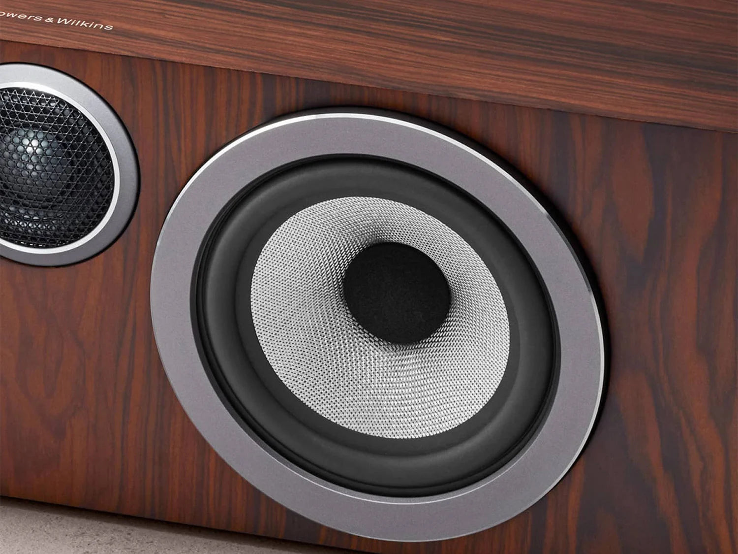 A closeup on the Continuum™ cone on a B&W HTM72 S3 Centre Channel speaker in mocha finish.