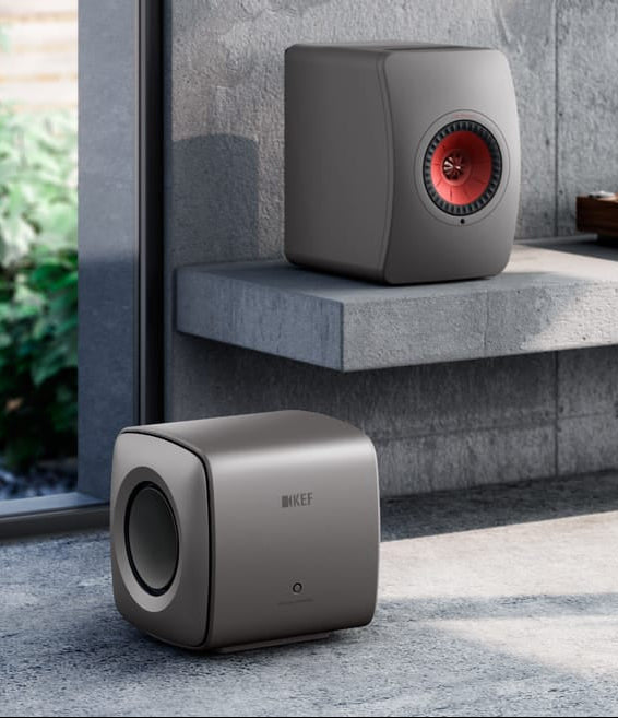 An ultra modern music room with KEF grey KC62 Subwoofer.