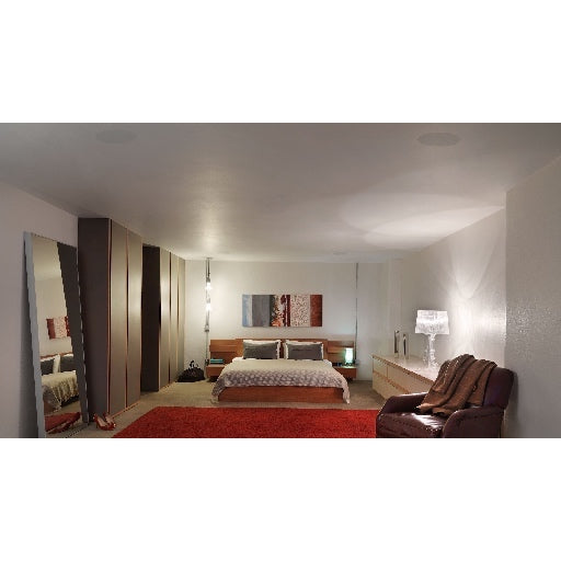 A basement bedroom with a B&W CCM665 In-Ceiling Speaker