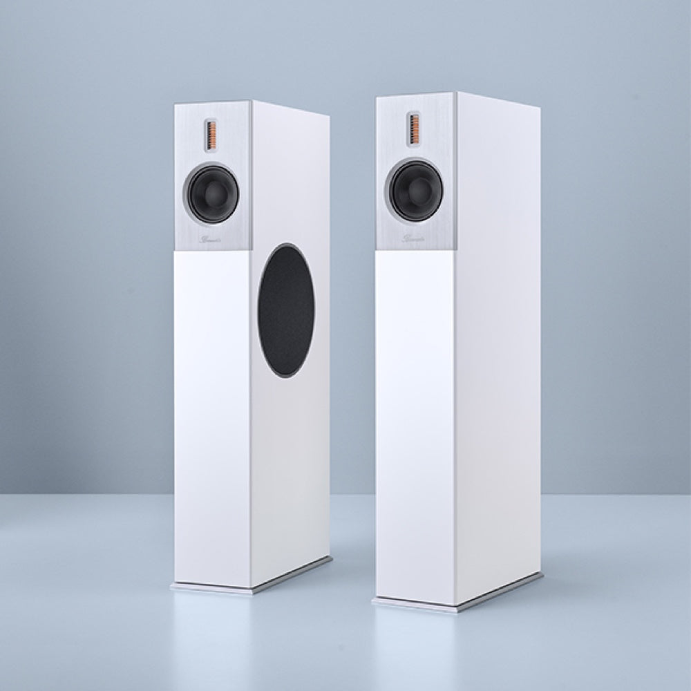 A pair of Burmester B38 top line speakers, featuring a slim, elegant design with a white finish and a front-panel speaker on each unit - HiFi Centre.