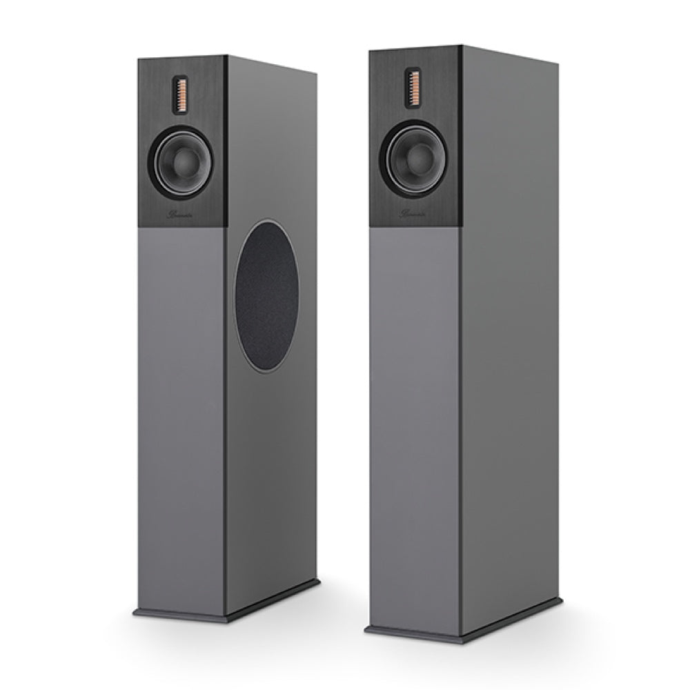 A pair of Burmester B38 top line speakers, featuring a slim, elegant design with a black finish and a front-panel speaker on each unit - HiFi Centre.