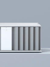 A closeup to a silver Burmester 216 Top Line Power Amplifier - HiFi Centre. 
