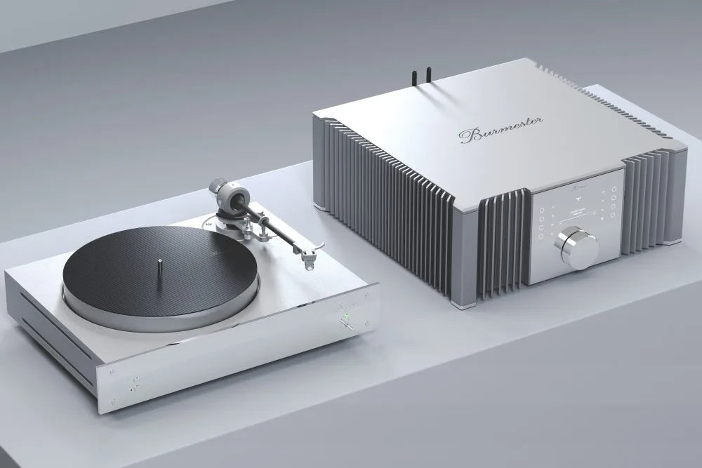  Burmester 232 Integrated Amplifier next to a turntable - Hi-Fi Centre.