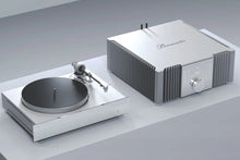  Burmester 232 Integrated Amplifier next to a turntable - Hi-Fi Centre.