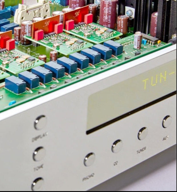 A closeup of the inside of a silver Burmester 035 Classic Line Preamplifier sold by Hi-Fi Centre.