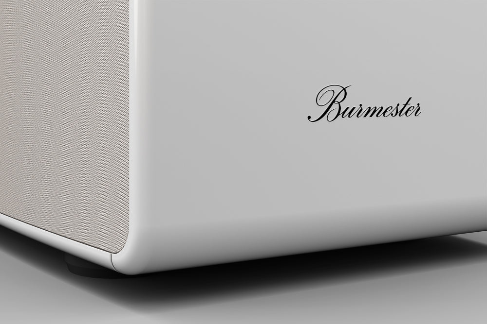 Close-up of a Burmester BX100 Reference Speaker on a gray background