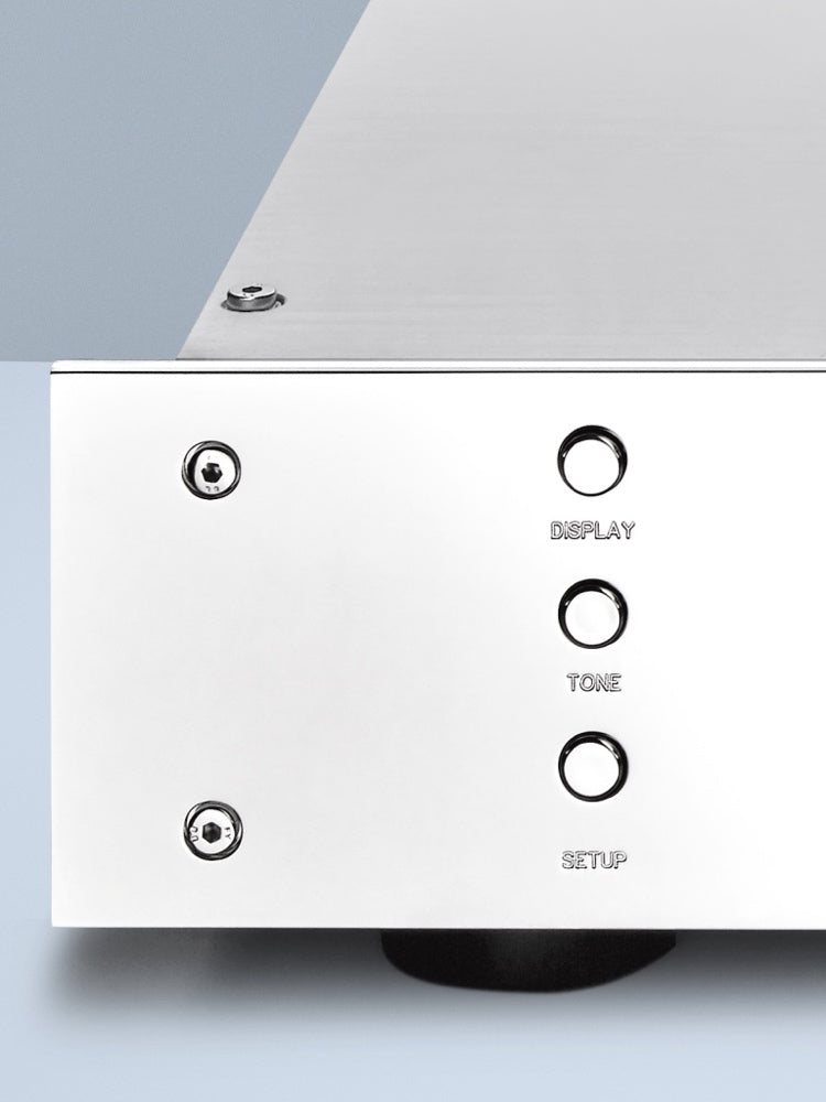 A closeup view of a silver Burmester 035 Classic Line Preamplifier sold by Hi-Fi Centre.