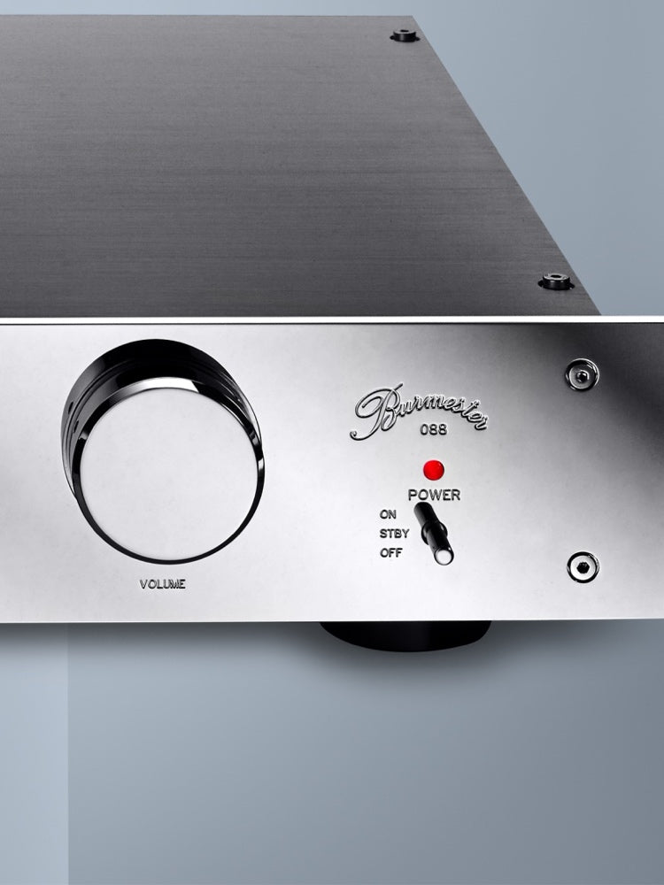 A closeup on a power button of a Burmester 088 Top Line Preamplifier sold by HiFi Centre.
