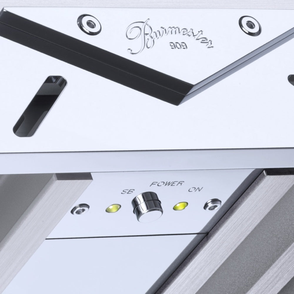 Silver Burmester 909 Reference Line Power Amplifier with a detail on a Burmester logo - Hi-Fi Centre.