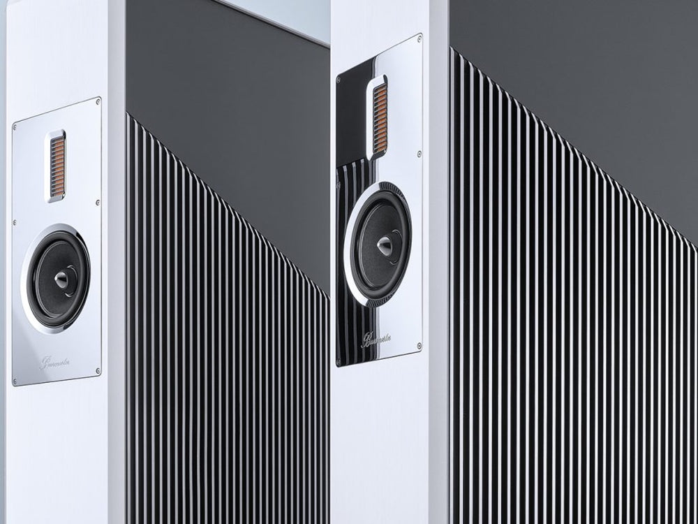 A front panel detail of a pair of Burmester BC150 floor-standing reference line speakers, featuring a white and gray color scheme with a solid aluminum frame - HiFi Centre.