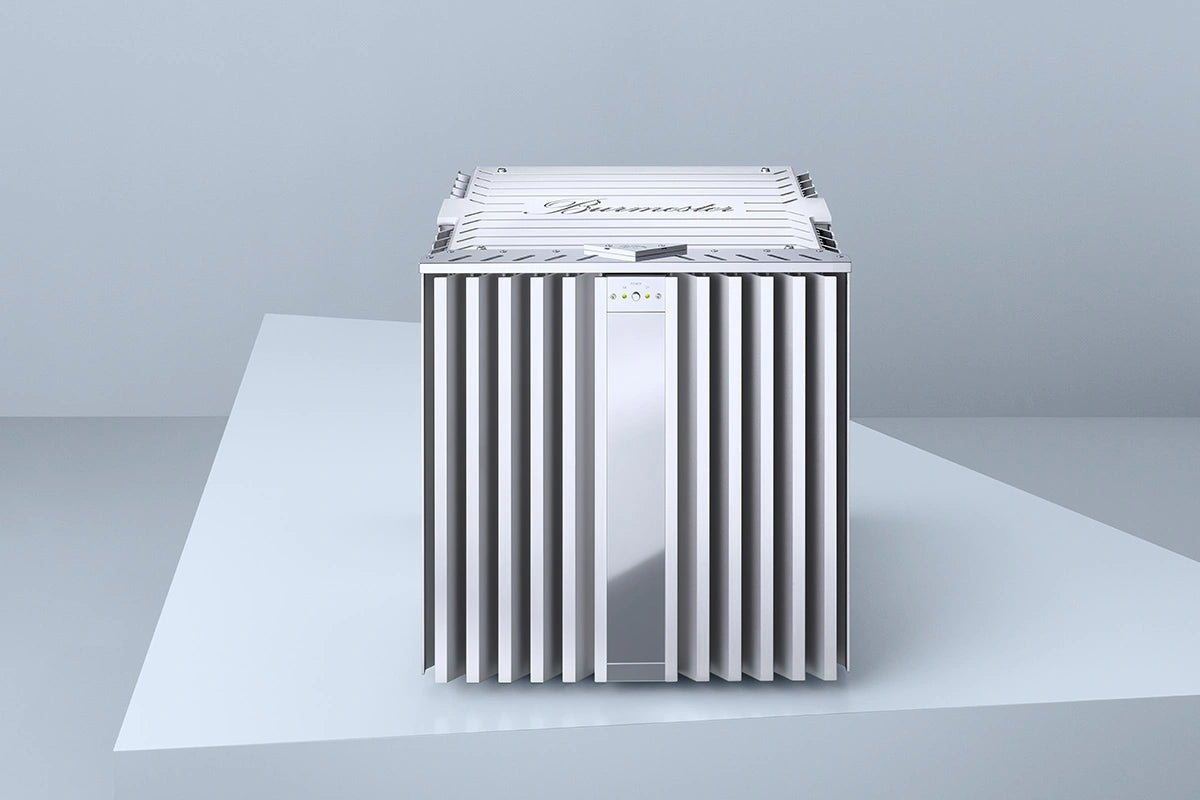 Silver  Burmester 909 Reference Line Power Amplifier with 'Burmester' branding on a light gray background - HiFi Centre.