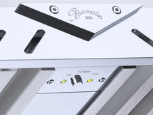 Close-up of a silver Burmester 909 Reference Line Power Amplifier with 'Burmester' branding and control buttons - HiFi Centre.