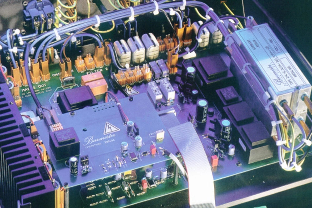Close-up of a electronic circuit board with various components of a Burmester 948 Power Line Conditioner - HiFi Centre.