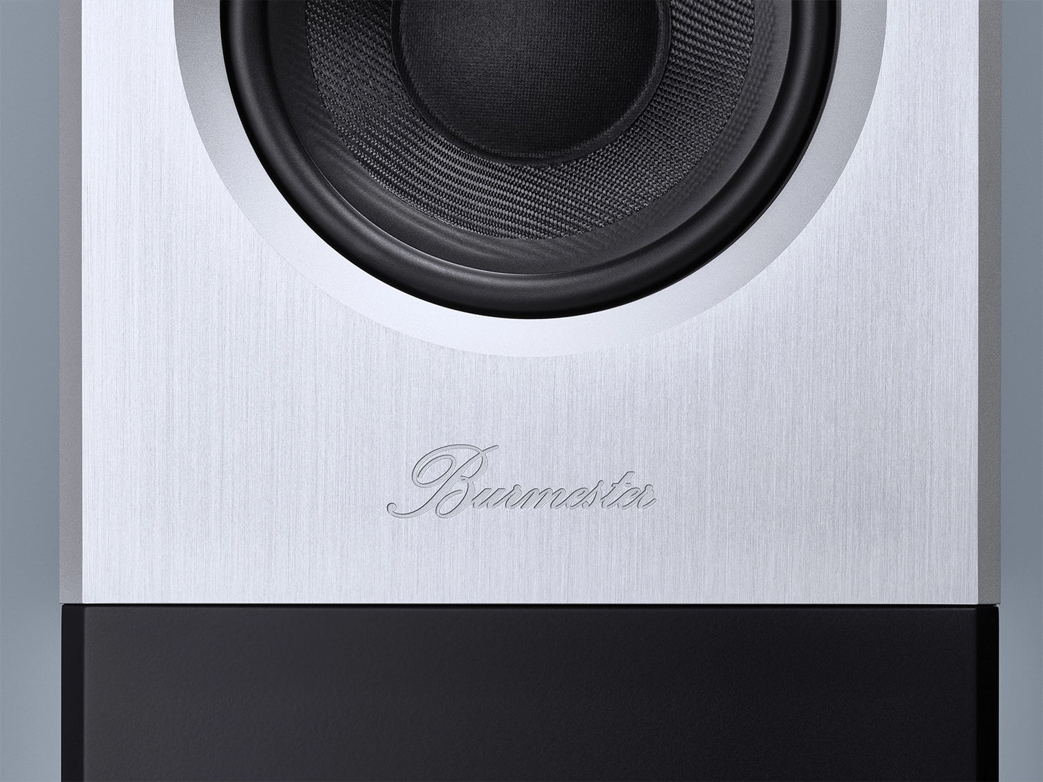 A detail of a Burmester logo on a Burmester B38 Top Line Speaker - HiFi Centre.