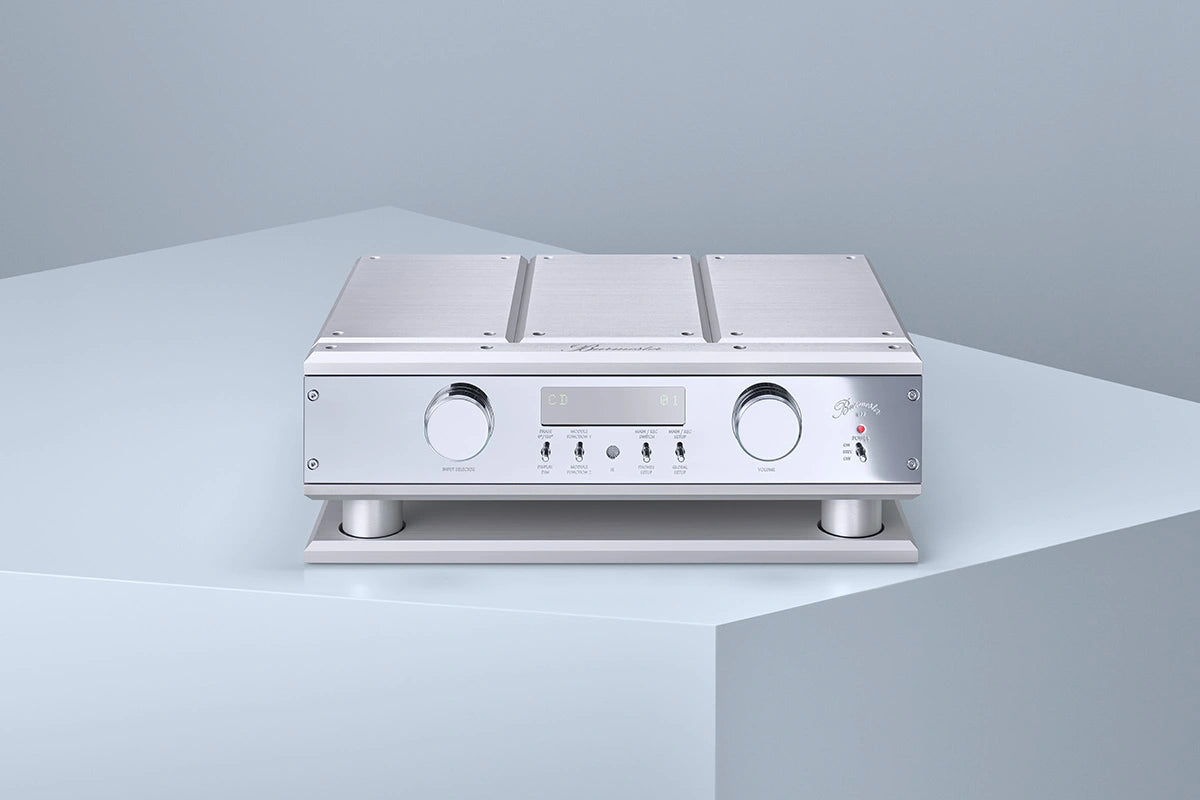 Silver audio Burmester 077 Reference Line Preamplifier on a light gray background.