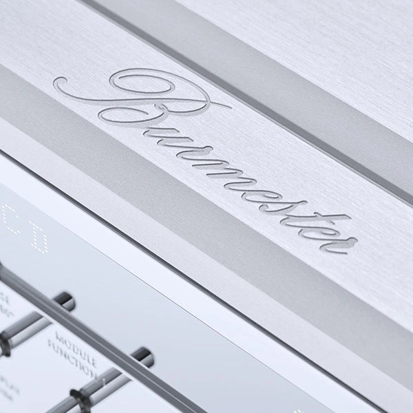 Close-up of a Burmester 077 Reference Line Preamplifier with engraved text on a metallic surface.