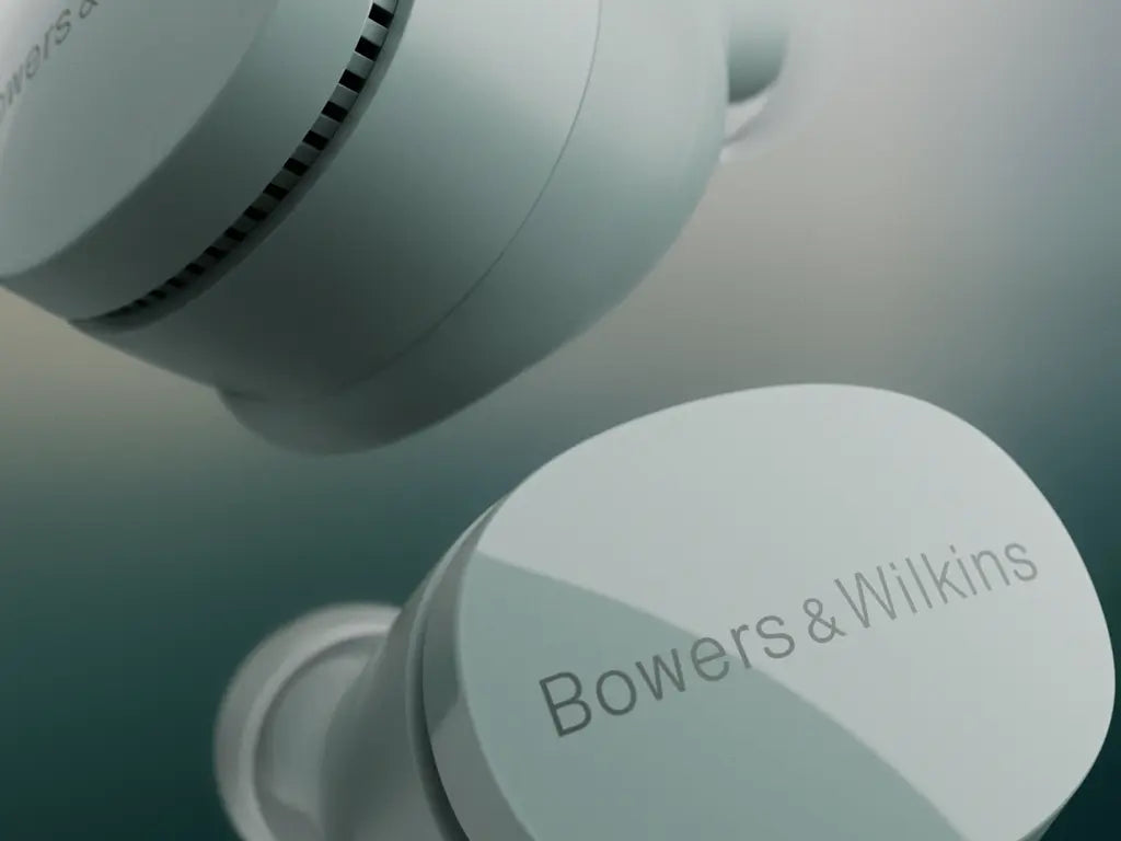 Close-up of Bowers & Wilkins Pi6 True Wireless In-Ear Headphones with a blurred background