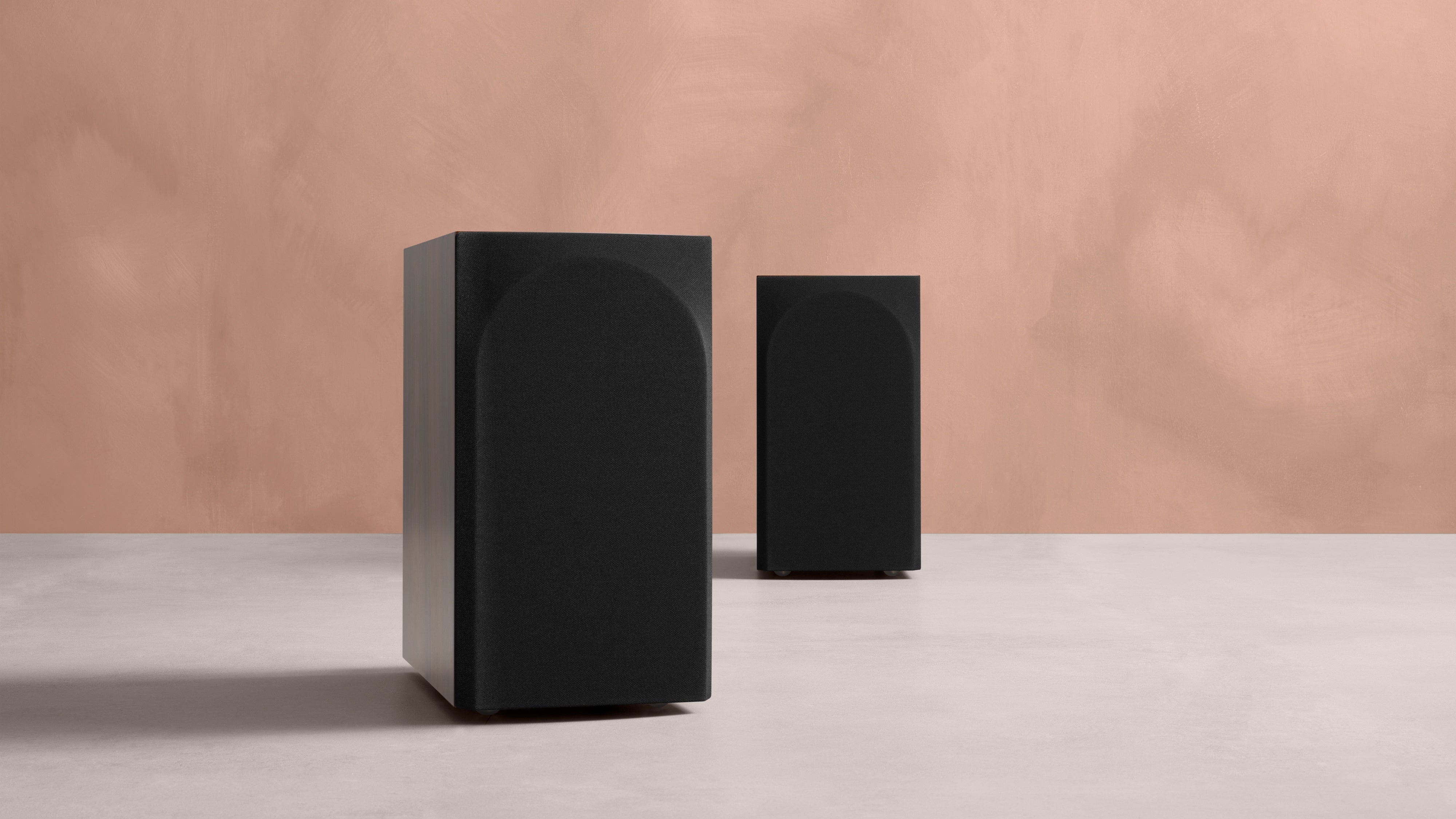 A closeup of the back of two B&W 706 S3 Bookshelf Speakers.