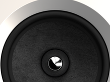 Close-up of a Burmester BX100 Reference Speaker cone with metallic driver on a white background