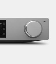 A closeup on a control knob on a Cambridge Audio CXN100 Network Streaming Player.