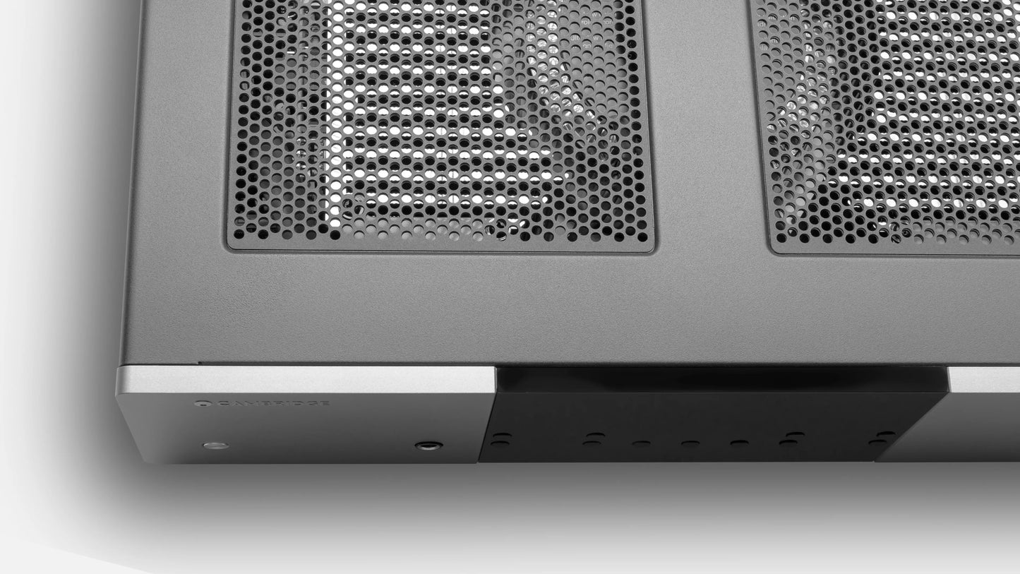 Close-up of a Cambridge Audio EXA100 Integrated Amplifier with honeycomb pattern on a white background - HiFi Centre