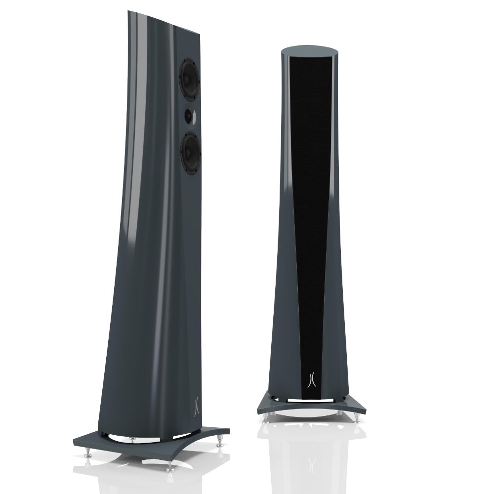 An Estelon Iron Grey Aura Floor Standing Speaker with a white front and black base, featuring a minimalist design.