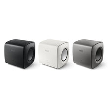 A lineup of all color variations of KEF KC62 Subwoofer.