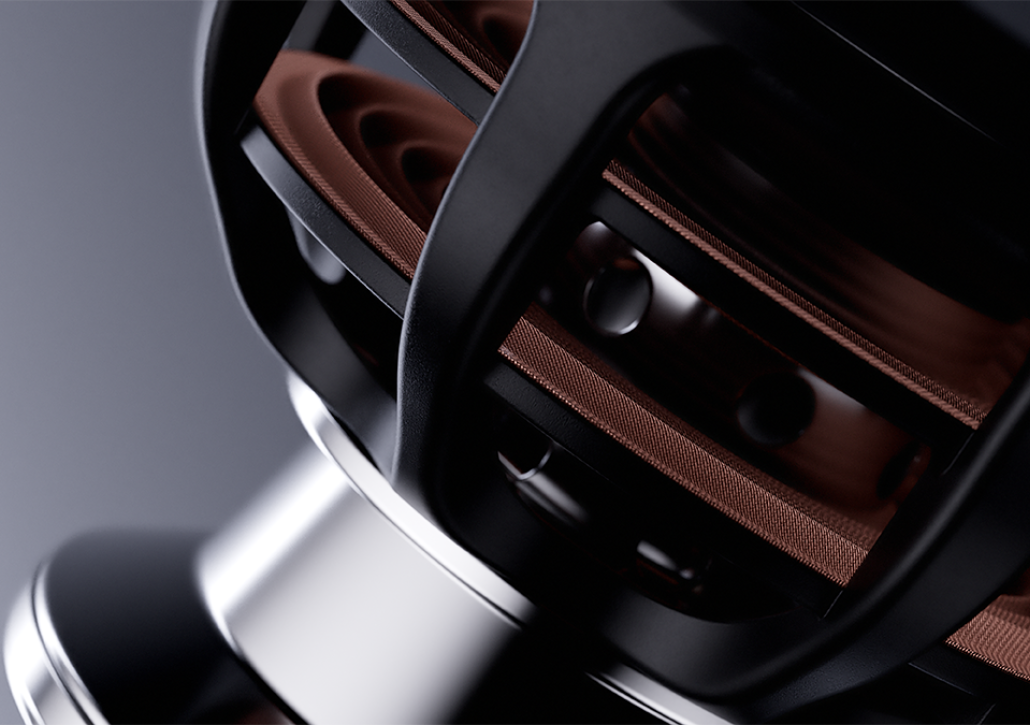 Close-up of a Linn 343 floor-standing speaker with a sculpted black frame and copper-brown drivers.