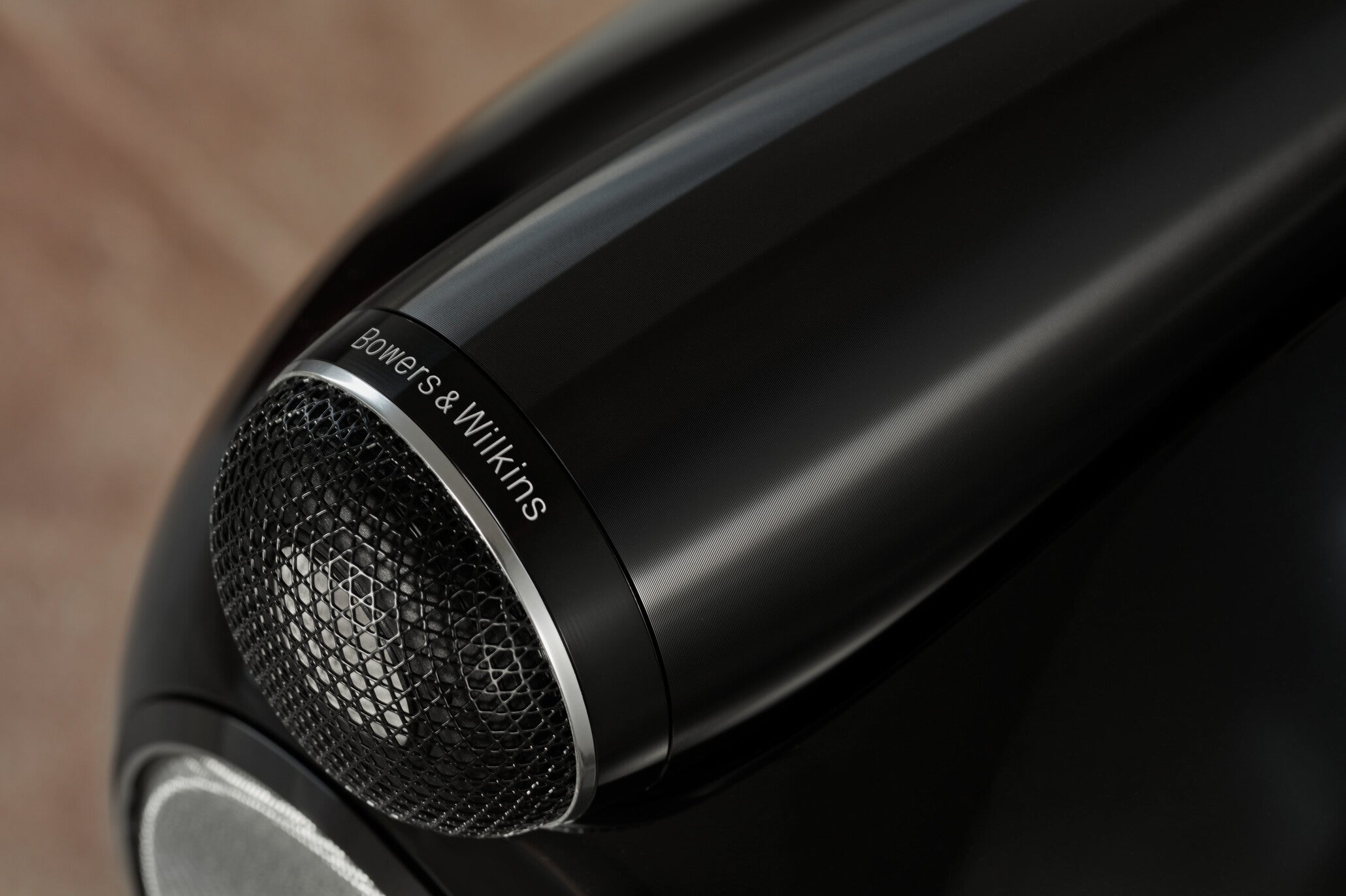 A closeup on the tweeter-on-top on a B&W 803 D4 Reference Speaker in gloss black finish.
