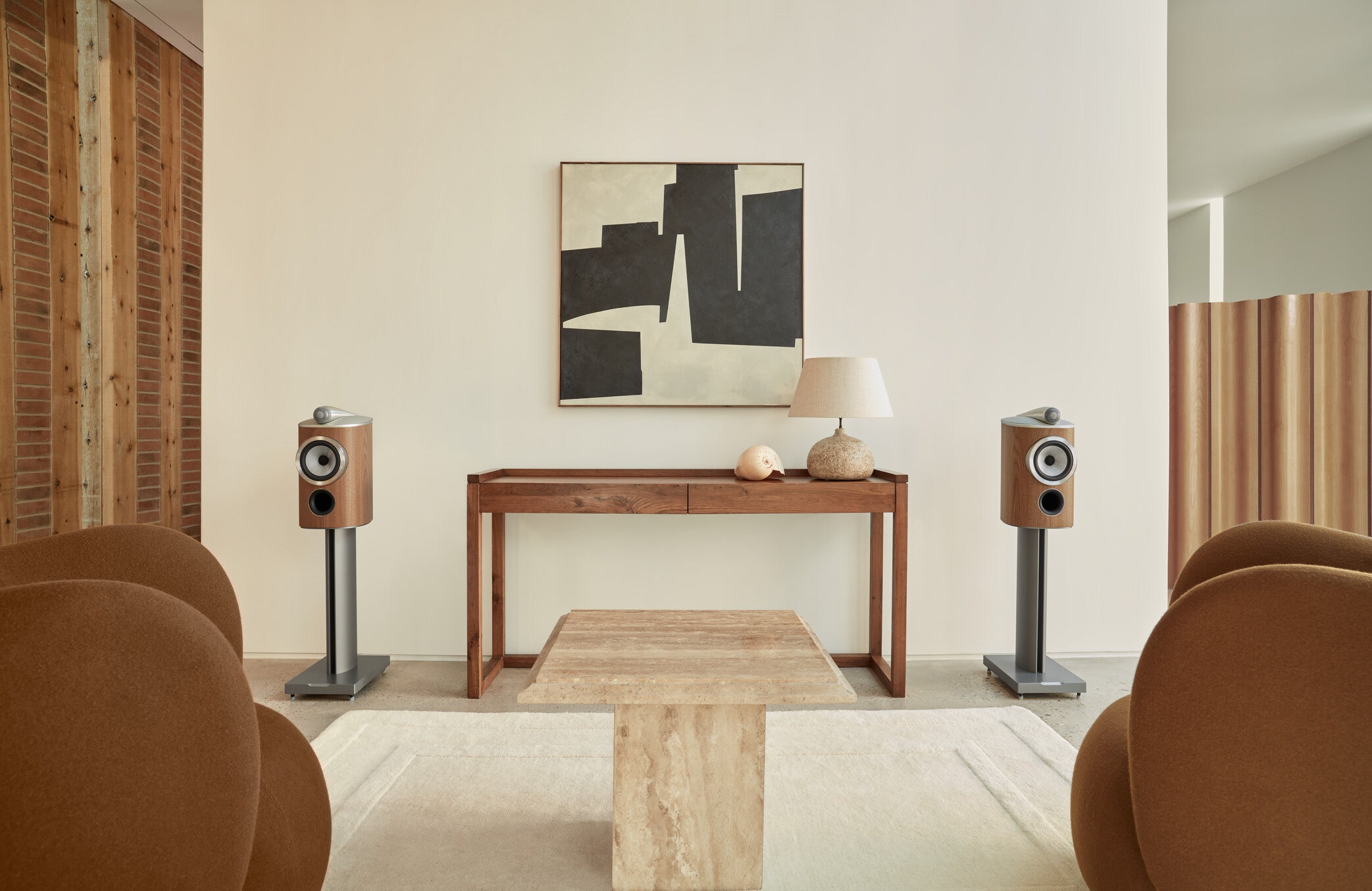 A pair of B&W 805 D4 Reference Speakers in walnut finish in a modern living room.