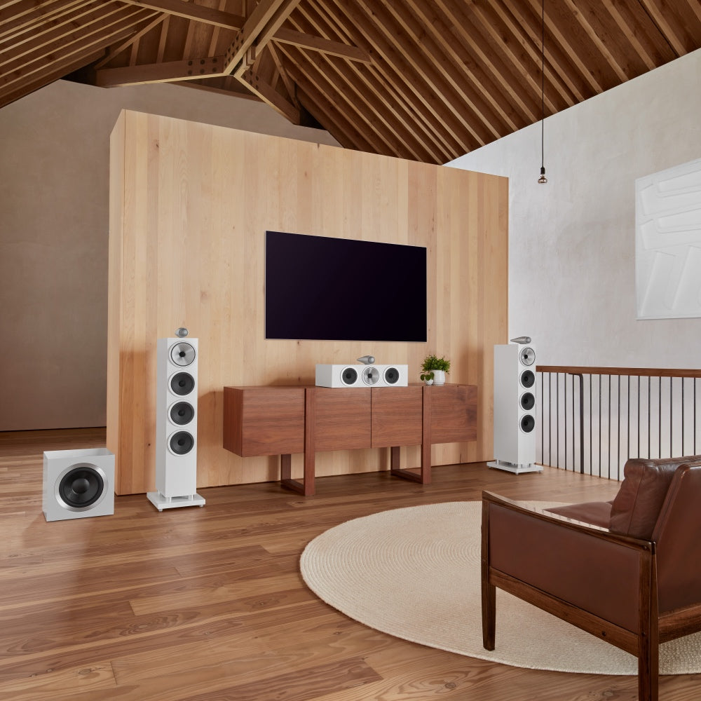Home theatre featuring B&W 702 S3 Floor Standing Speakers in satin white finish.