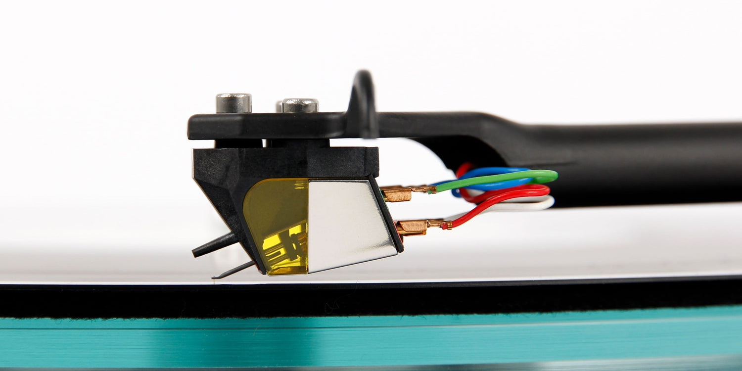 Close-up of a vinyl record player Rega ND7 MM Phono Cartridge on a white background