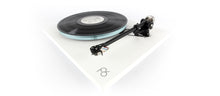 A high-fidelity turntable with a minimalist white rectangular base and a Rega ND5 MM Phono Cartridge, set against a clean white background.