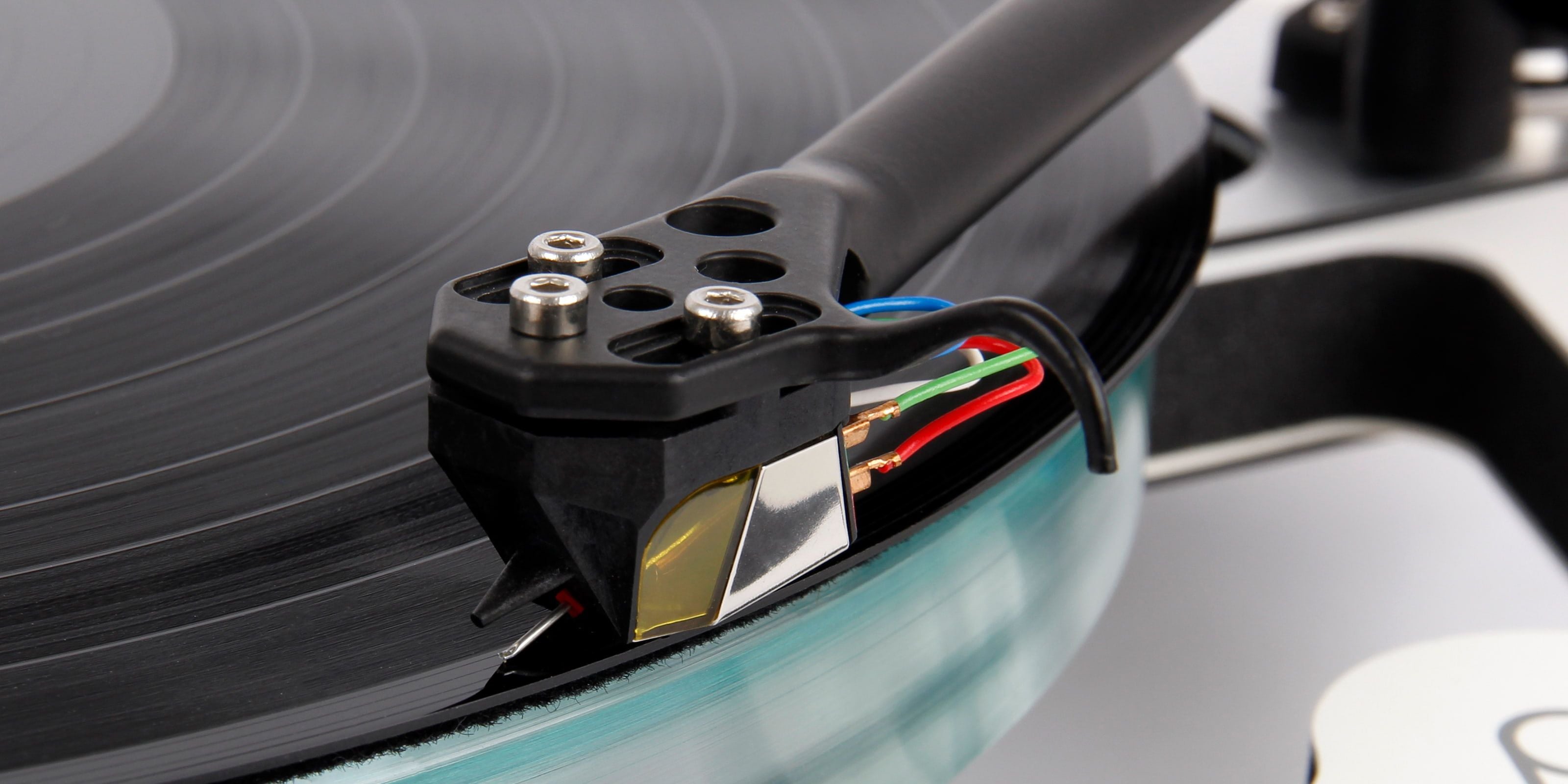 Close-up of a vinyl record player Rega ND7 MM Phono Cartridge on a turntable