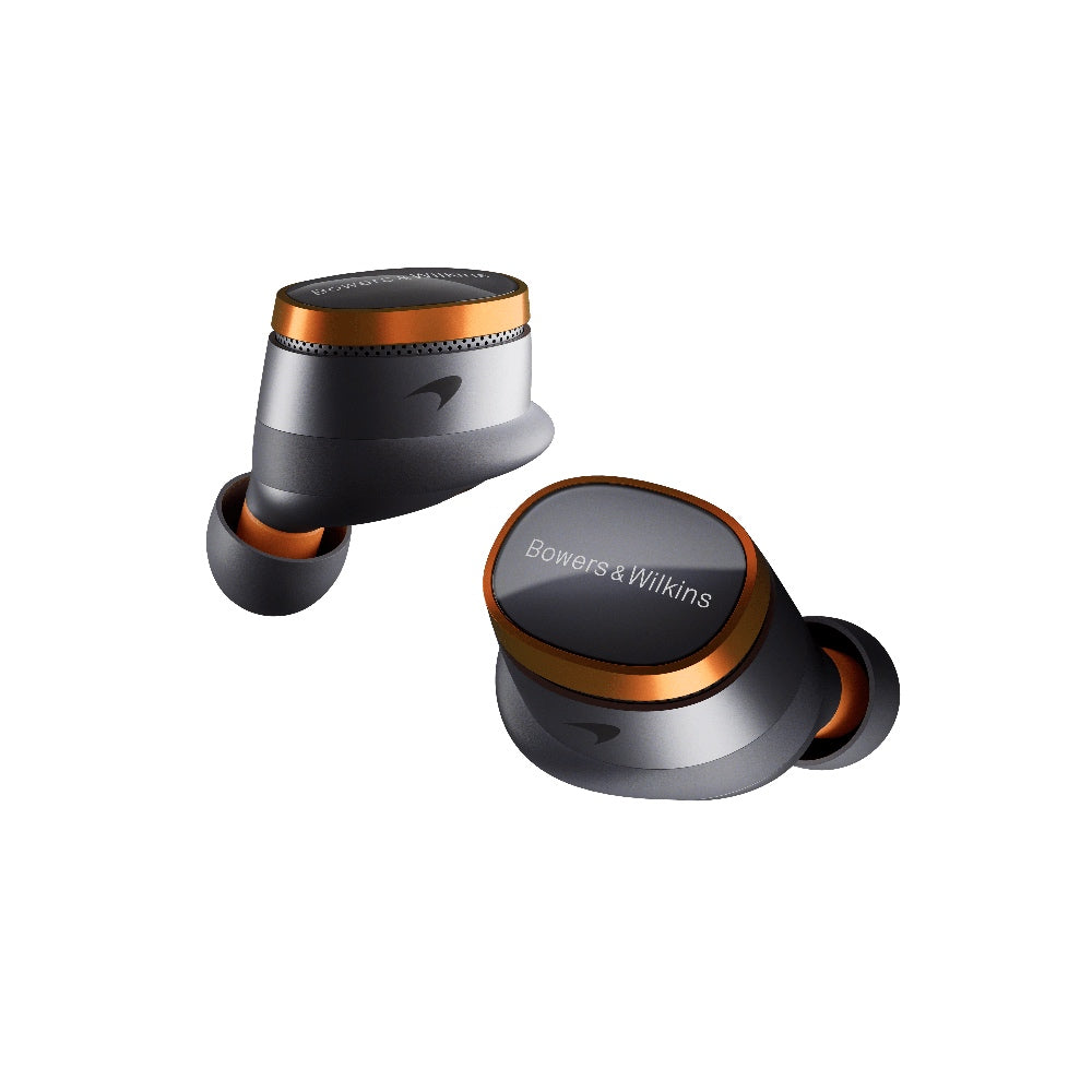 A pair of Bowers & Wilkins PI8 McLaren Edition in-ear headphones in Galvanic Grey with Papaya orange accents.