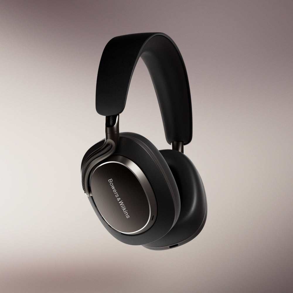 Black Bowers & Wilkins PX8 S2 Wireless headphones with brand logo on a gradient background