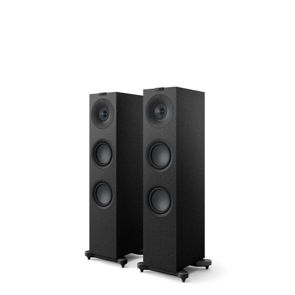 A pair of black KEF Q7 Meta Floor Standing Speakers with visible woofers and tweeters.