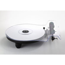 White Rega Replay turntable with a minimalist platter, black tonearm, and compact black base.