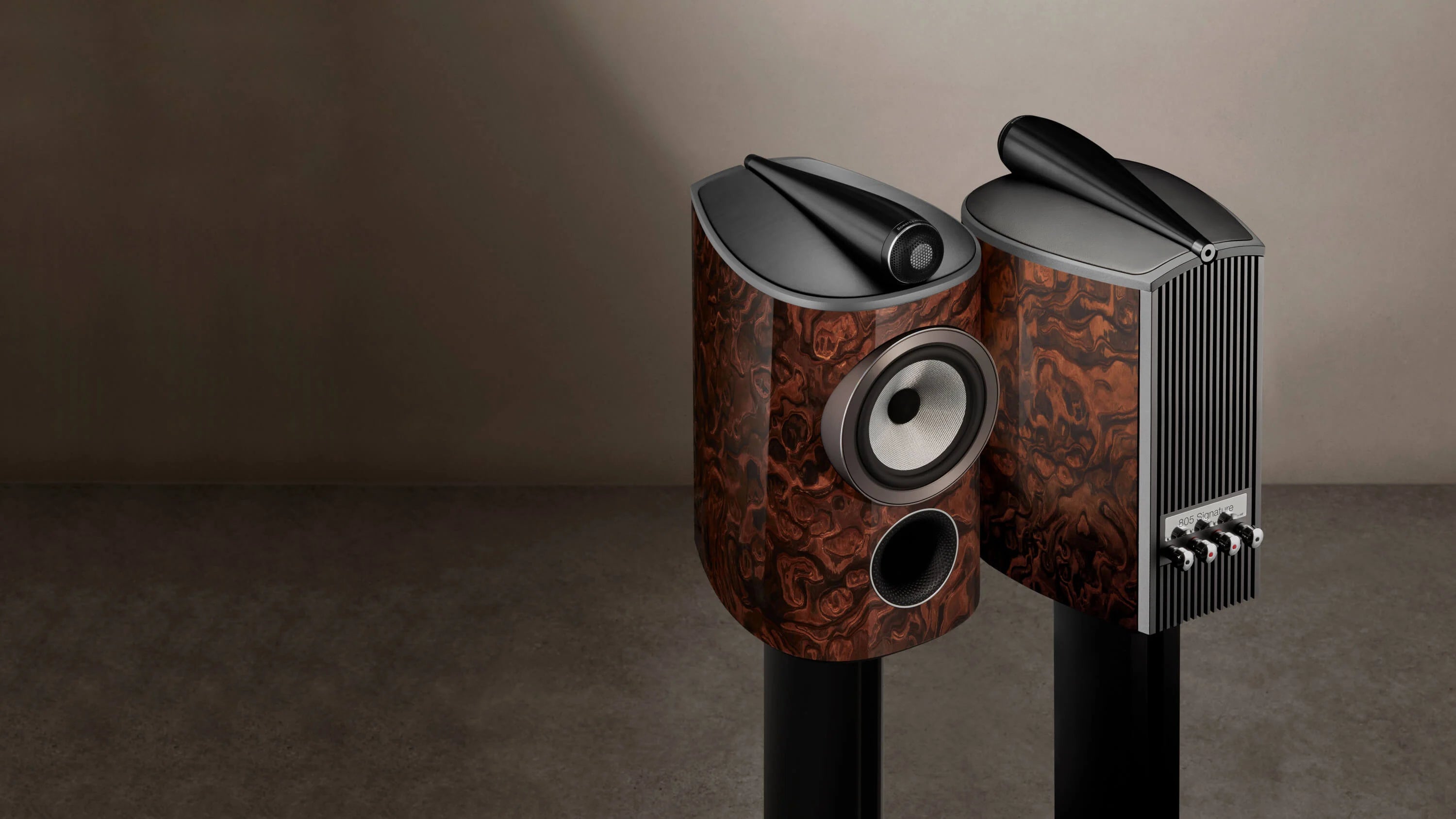 A front and a back view of a B&W 805 Signature Bookshelf Speaker.