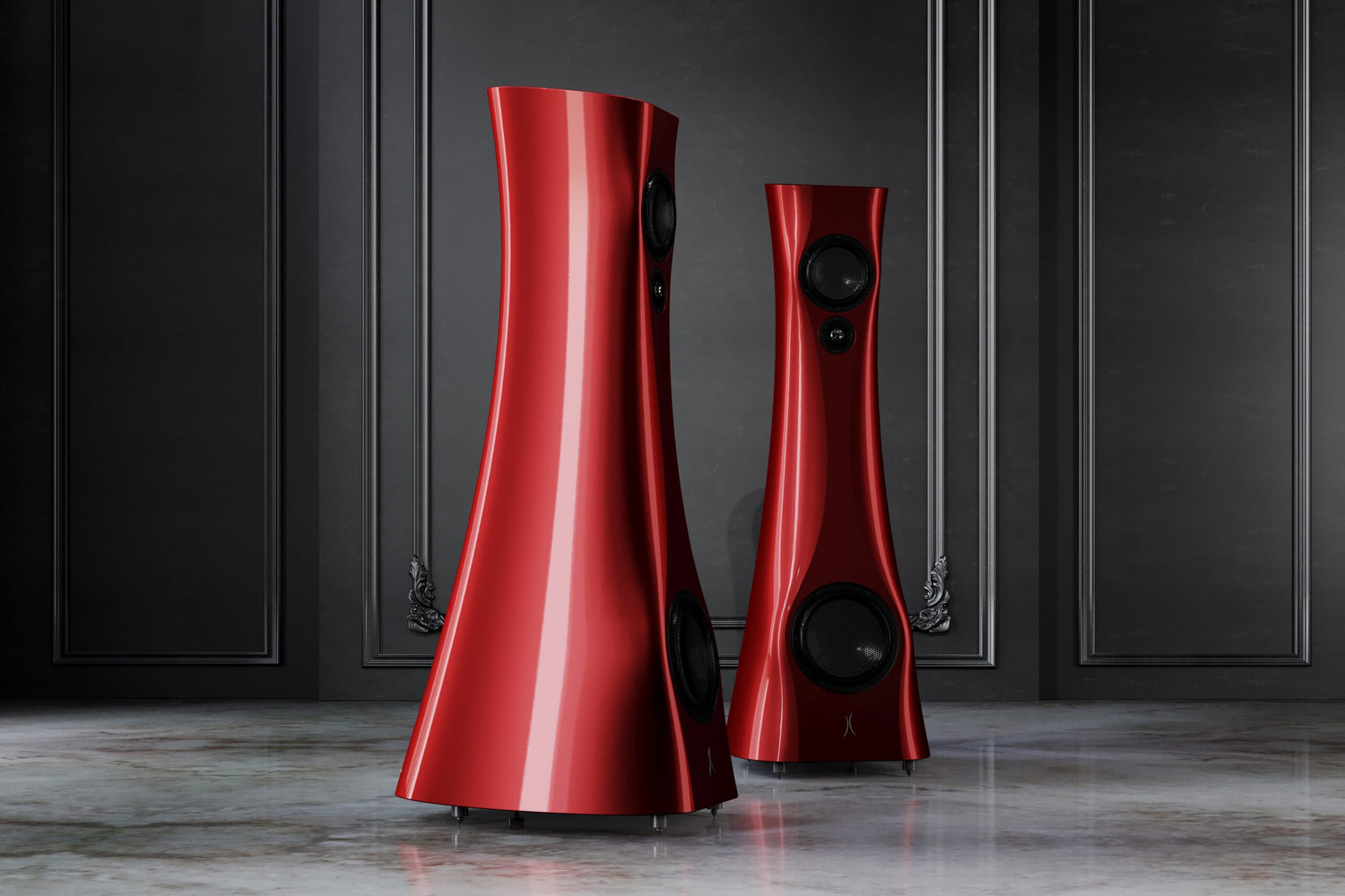A pair of Red Rocket Liquid Gloss Estelon XB Diamond MK II floor-standing speakers with a diamond tweeter and a mid-woofer. in an upscale living room.