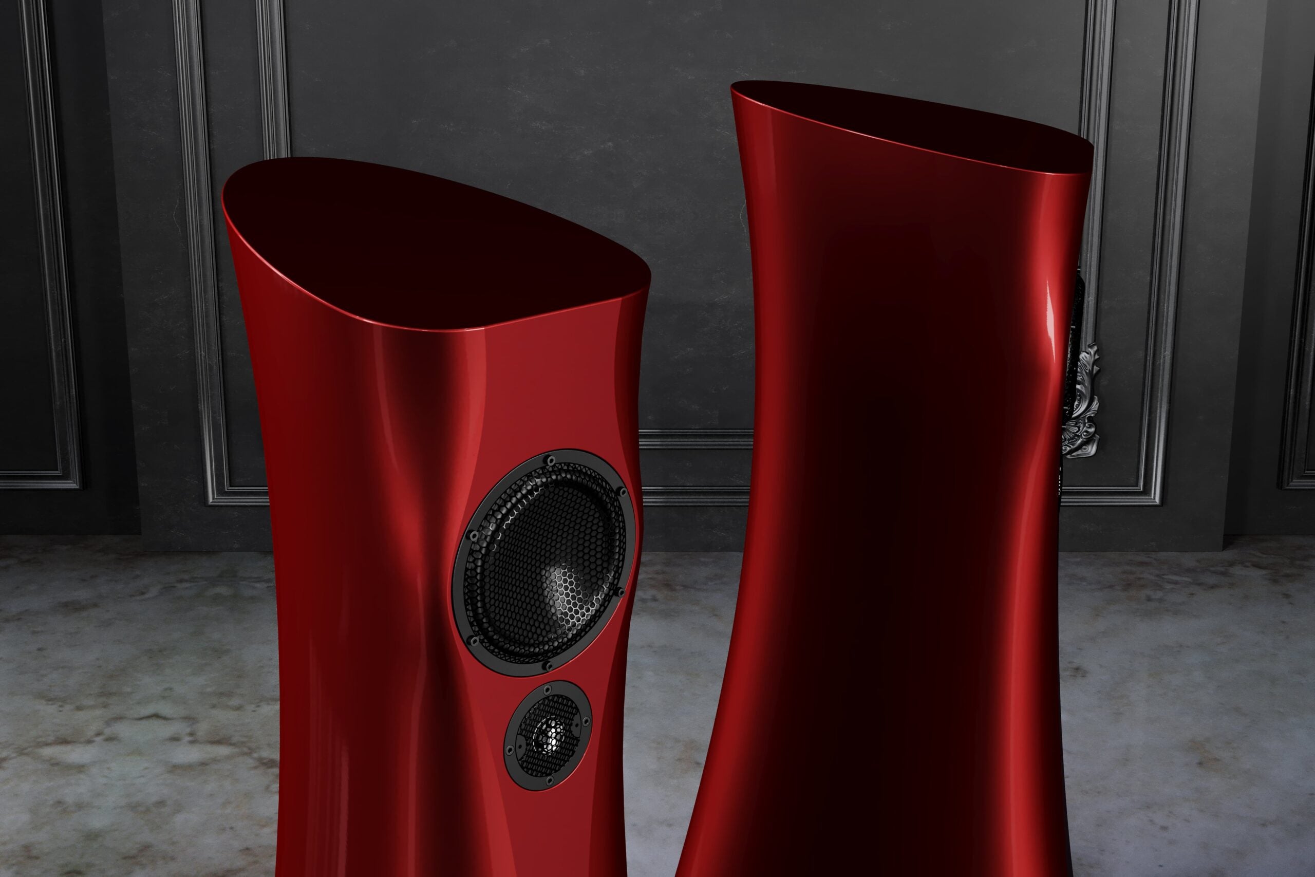 A closeup on a pair of Red Rocket Liquid Gloss Estelon XB Diamond MK II floor-standing speakers with a diamond tweeter and a mid-woofer. in an upscale living room.
