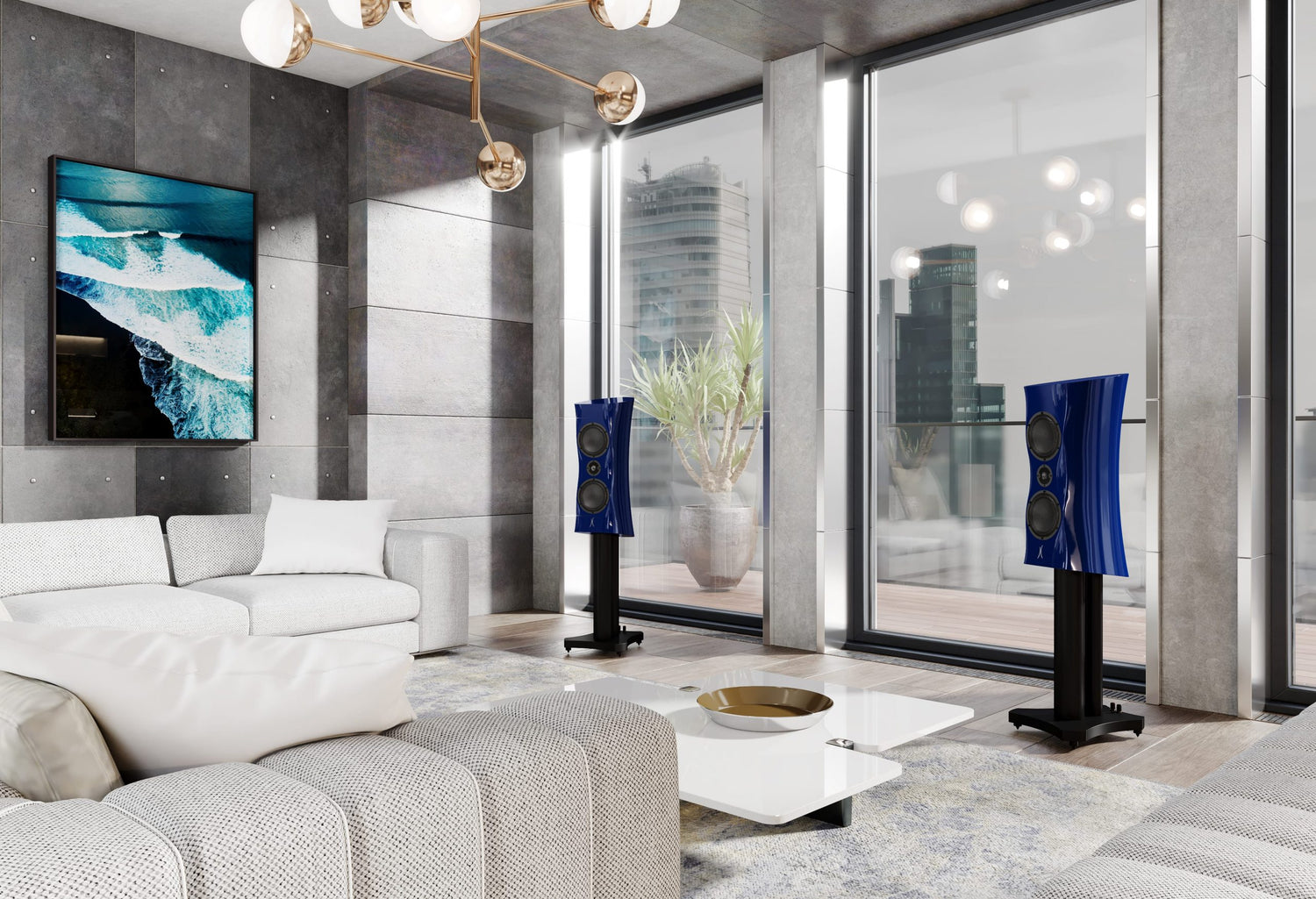 A pair of Estelon XC Diamond MK II stand mount speakers, featuring a sleek design with a blue metallic finish and black base in a modern living room.